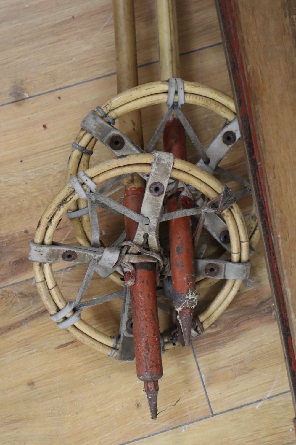 A set of wooden skis and poles